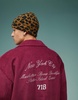 ASOS DESIGN oversized corduroy varsity jacket in burgundy