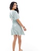 Vero Moda button up mini skater dress in mint green floral