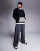ASOS DESIGN oversized fleece sweatshirt with quarter zip and pocket in black
