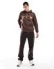 Another Influence les monts slogan hoodie in brown