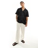 ASOS DESIGN short sleeve relaxed deep revere collar satin shirt in black