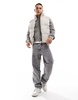 Bershka puffer vest in stone