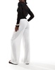 Bershka crinkle beach pants in white