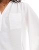 ASOS DESIGN v neck pocket detail soft blouse in ivory