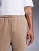 ASOS DESIGN tapered fleece sweatpants in brown