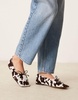 ASOS DESIGN Lotus premium suede ballet flats in cow print