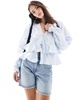 ASOS DESIGN long sleeve tie front ruffle hem top in blue stripe