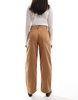 ASOS DESIGN barrel leg jeans in tan with gold details