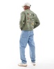 ASOS DESIGN boxy oversized sweatshirt with box fruit back print in green