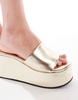 ASOS DESIGN Tornado mule flatform sandals in gold
