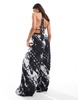 ASOS DESIGN halter neck tie detail wide leg jumpsuit in abstract print