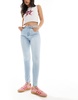 Bershka high waist skinny jeans in light wash blue