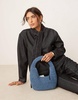 ASOS DESIGN hand crochet straw shoulder bag in blue