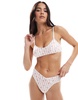 Cotton On cotton pointelle thong brief in bow stripe