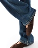 ASOS DESIGN Tall mid rise flare jeans in dark tinted blue