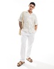 ADPT oversized revere collar shirt with floral print in beige