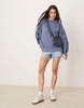 ASOS DESIGN oversized sweat with seam detail and cutwork sleeves in washed blue