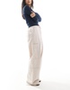 ASOS DESIGN pants with tie hems and clean utility pockets in stone