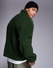 ASOS DESIGN oversized quarter zip fleece sweatshirt in dark green with chest pocket