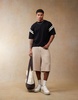 ASOS DESIGN oversized boxy T-shirt with white paneling in black