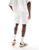 Bershka cargo pocket shorts in white
