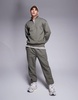 ASOS DESIGN premium heavyweight oversized quarter zip sweatshirt in khaki