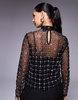 River Island sequin mesh long sleeve top in black