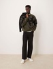 ASOS DESIGN relaxed boxy fit knit crew neck sweater with pattern in black
