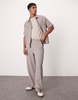 Bershka wide leg plisse pants in light brown - part of a set