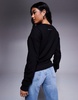 Armani Exchange lunar capsule logo sweatshirt in black