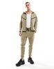Nike Tech Fleece cuffed sweatpants in khaki