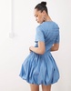 Amy Lynn Eleanor puffball mini dress in blue chambray
