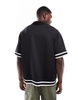Bershka tipped sleeve shirt in black