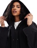 ASOS DESIGN clean longline puffer coat with hood in black