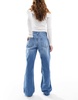 Bershka ripped knee wide leg jeans in mid blue