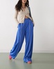 Monki wide leg pull on track pants with white piping in blue