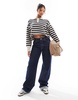 Bershka textured knitted polo sweater in black and tan stripe