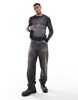 Bershka faded knitted sweater in black