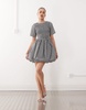 Amy Lynn shirred peplum mini dress with tie back in mono gingham