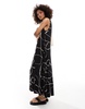 ASOS DESIGN sleeveless trapeze maxi with D-ring back detail in black print