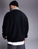 ASOS DESIGN oversized fleece sweatshirt with quarter zip and pocket in black