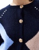 ASOS DESIGN knitted crew neck cardigan with gold button in navy argyle pattern