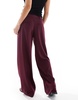 Bershka Petite low rise wide leg tailored pants in burgundy