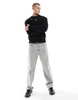 Bershka distressed knitted sweater in black