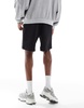 Bershka jersey shorts in black