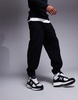 ASOS DESIGN tapered fleece sweatpants in black