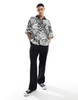 ASOS DESIGN boxy oversized revere shirt in black and white floral print
