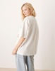 ASOS DESIGN oversized tee with paris valentines graphic in cream