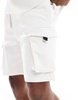 Bershka cargo pocket shorts in white