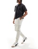 Bershka cuffed cargo pants in beige